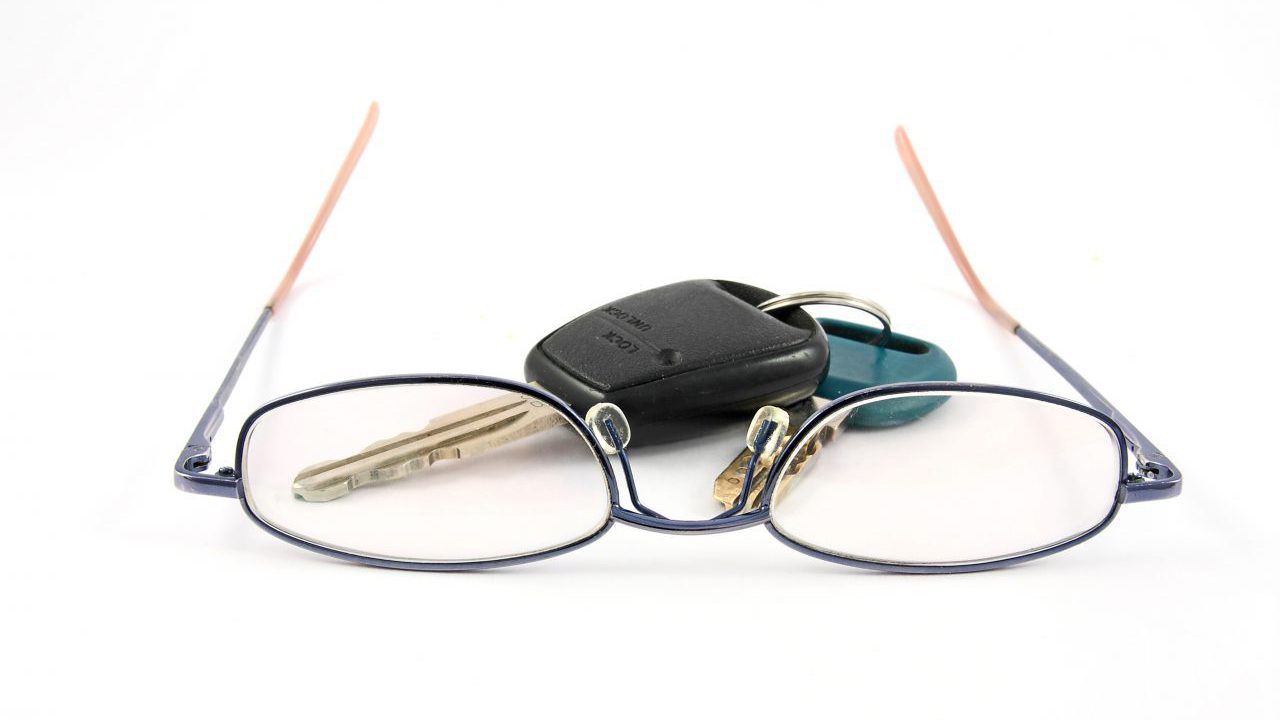 decorative image of eyeglasses and car keys